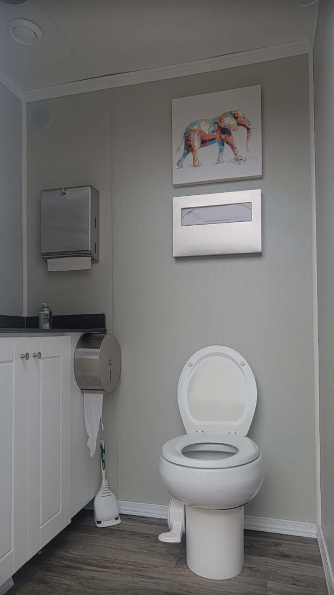 KLASSIK Restrooms 3-Unit Women's Suite Interior — Elephant Canvas Art, Gold Round Mirror